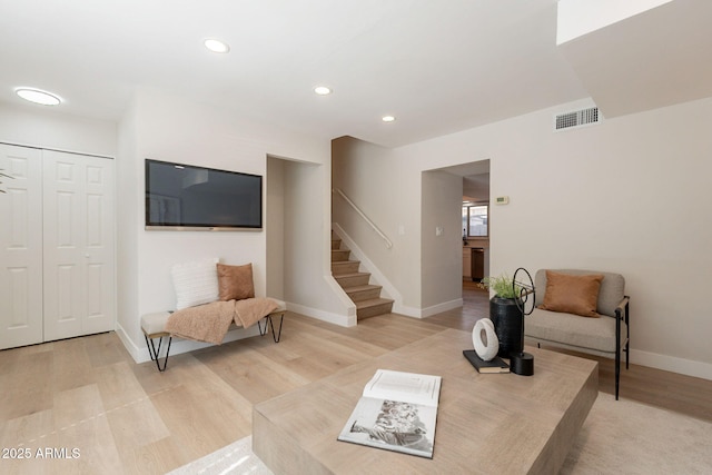 1301 N 44th St, Phoenix, AZ 85008 - living area featuring stairway, light wood-style flooring, baseboards, and recessed lighting