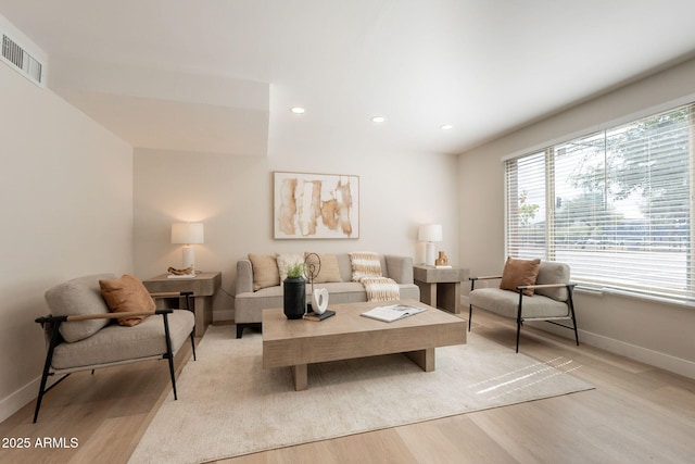 1301 N 44th St, Phoenix, AZ 85008 - living area with light wood-type flooring, baseboards, and recessed lighting