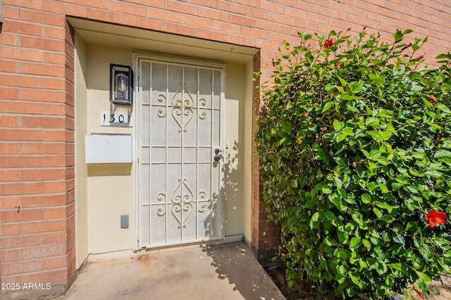 1301 N 44th St, Phoenix, AZ 85008 - view of exterior entry featuring brick siding