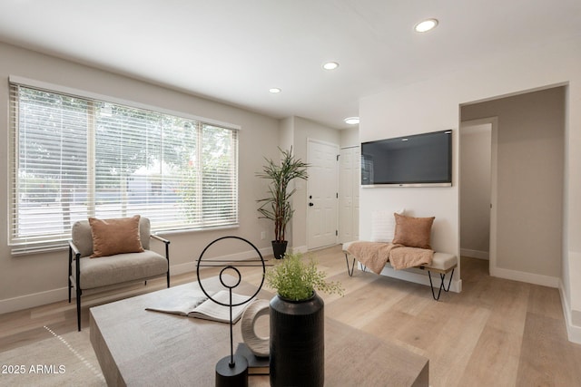 1301 N 44th St, Phoenix, AZ 85008 - living room featuring baseboards, recessed lighting, and light wood-style floors