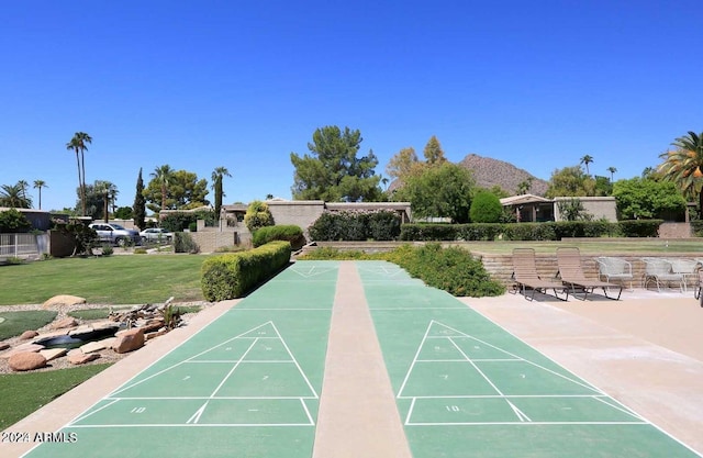 view of home's community featuring a lawn