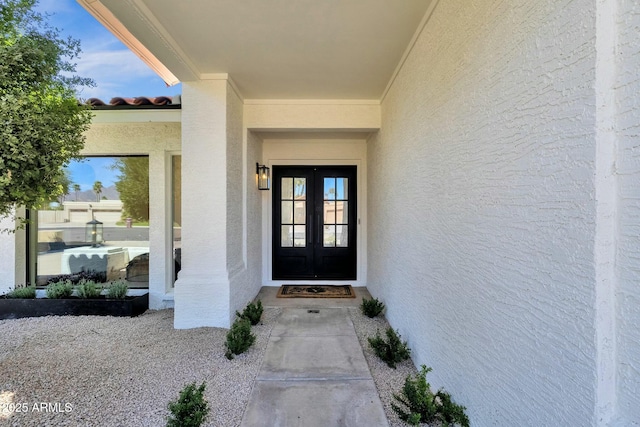 10013 N 106th Pl, Scottsdale, AZ 85258 - entrance to property with a tiled roof, french doors, and stucco siding