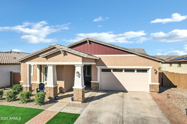 view of front of home featuring a garage and covered porch