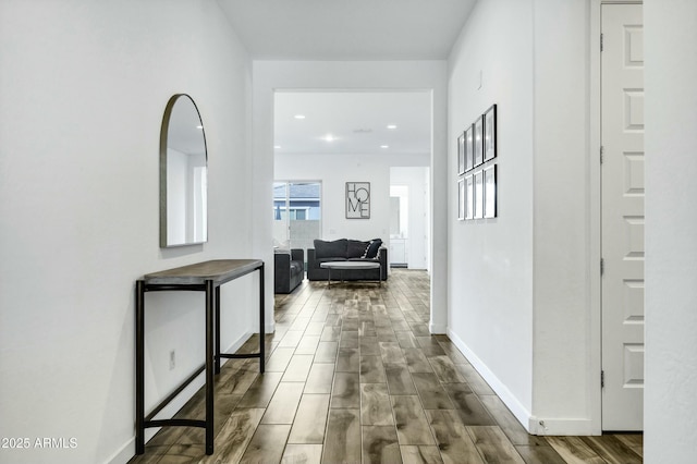 corridor featuring wood-type flooring