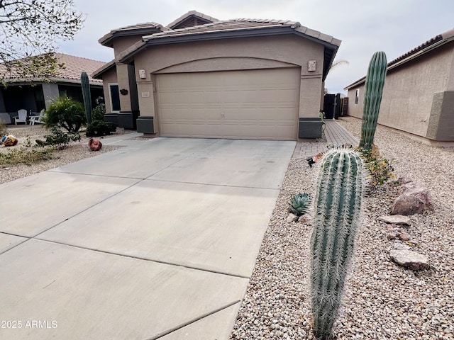 single story home with a garage