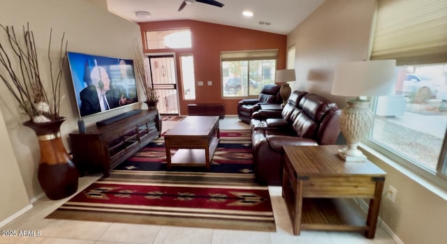 tiled living room featuring vaulted ceiling and ceiling fan