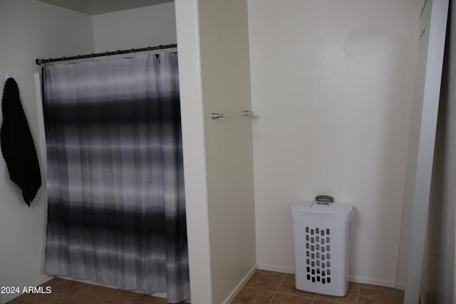 bathroom with tile patterned floors