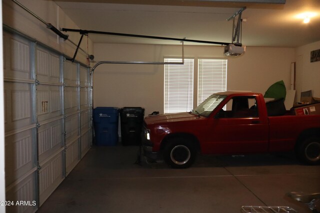 garage featuring a garage door opener