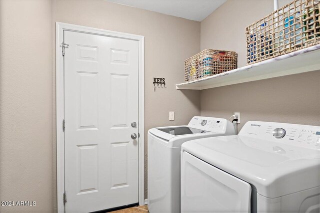 laundry room featuring independent washer and dryer