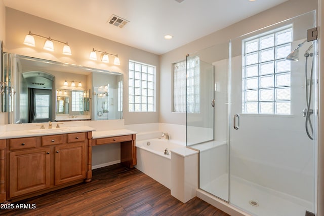 18283 N 93rd St, Scottsdale, AZ 85255 - full bathroom featuring a shower stall, wood finished floors, a bath, healthy amount of natural light, and recessed lighting