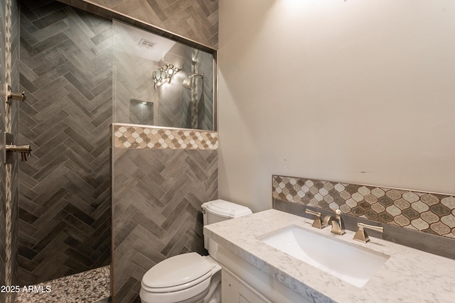 18283 N 93rd St, Scottsdale, AZ 85255 - full bath featuring toilet, walk in shower, vanity, and tasteful backsplash