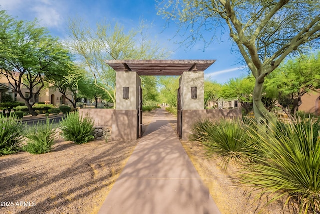 18283 N 93rd St, Scottsdale, AZ 85255 - view of home's community featuring a gate and a pergola