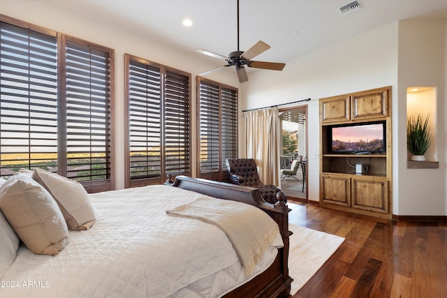 bedroom with ceiling fan, access to outside, dark hardwood / wood-style floors, and lofted ceiling