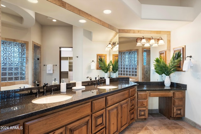 bathroom with vanity and an inviting chandelier