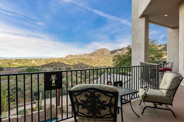 balcony featuring a mountain view