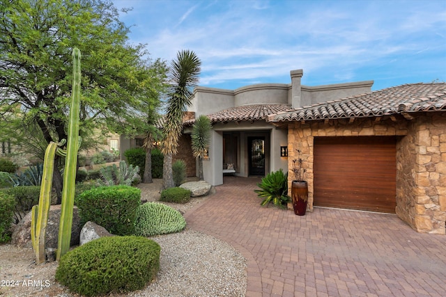 view of front of property featuring a garage