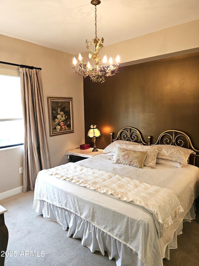 bedroom featuring an inviting chandelier, baseboards, and carpet