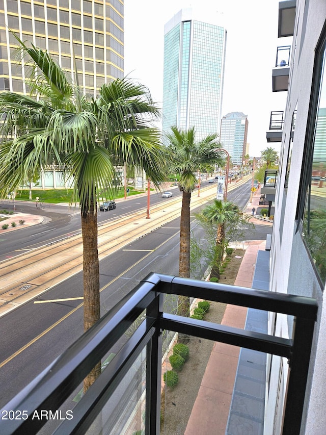 balcony featuring a view of city