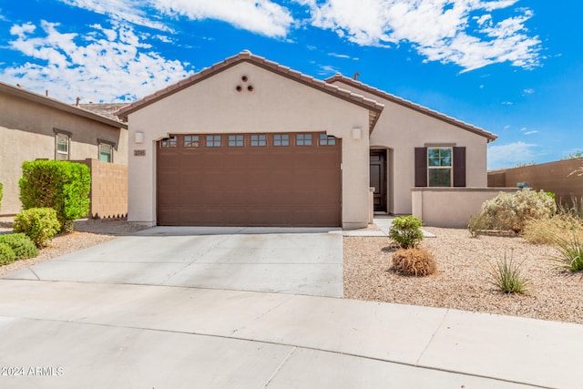 view of front of home with a garage