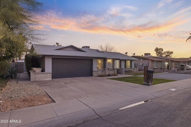 view of front of home featuring a garage