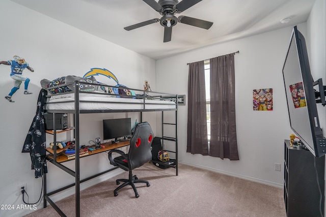 bedroom featuring ceiling fan and carpet