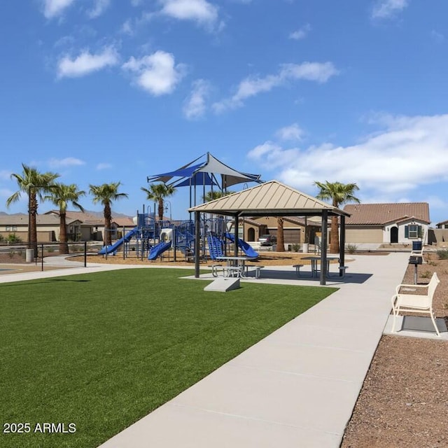 view of community with a playground, a gazebo, and a yard