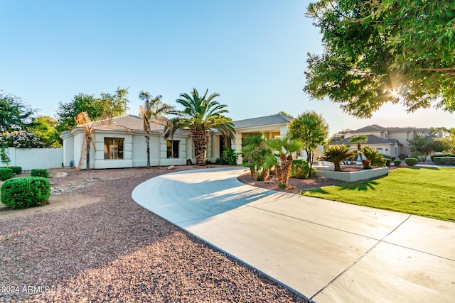 view of front of home with a front yard