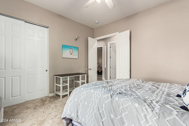 bedroom with a closet, ceiling fan, and carpet floors