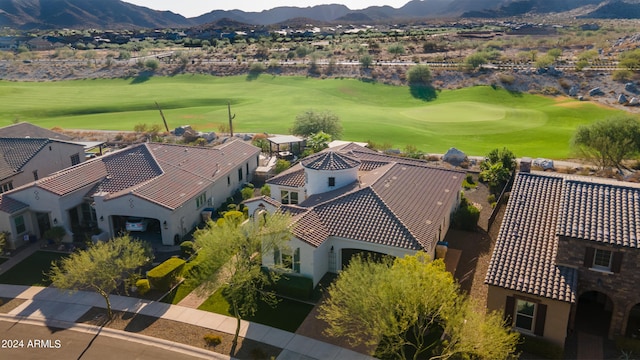 birds eye view of property featuring a mountain view