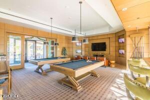 game room featuring carpet floors, wood walls, french doors, and billiards