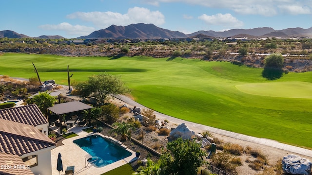 surrounding community with a pool, a gazebo, a mountain view, and a patio area