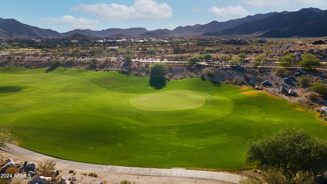 surrounding community featuring a mountain view