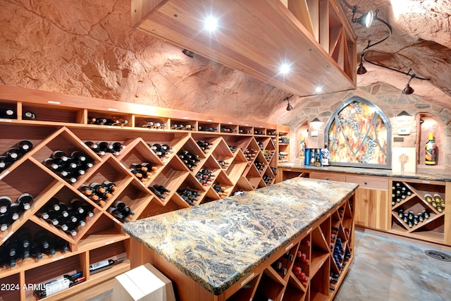 wine area with concrete flooring