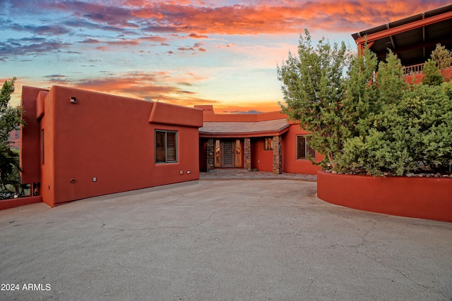 view of property exterior at dusk