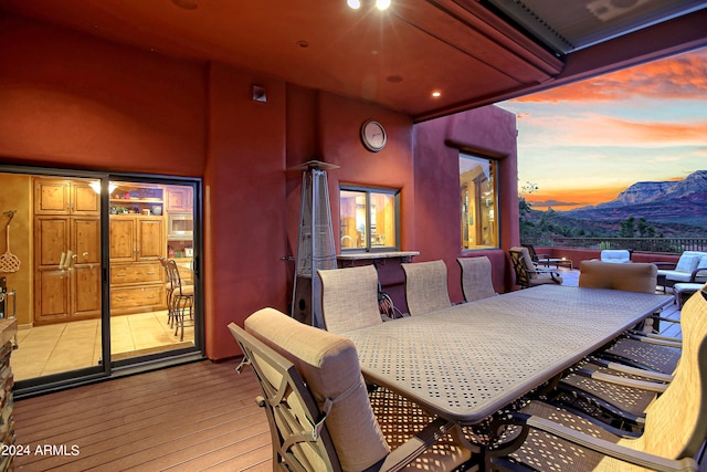 patio terrace at dusk with a mountain view