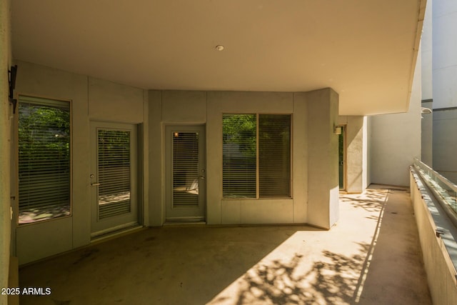 entrance to property with a patio area
