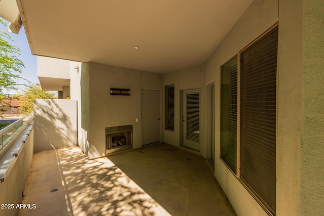 exterior space featuring exterior fireplace