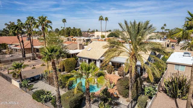 birds eye view of property with a residential view