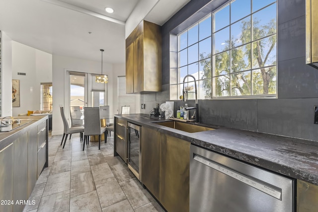 kitchen with decorative backsplash, sink, decorative light fixtures, dishwasher, and wine cooler