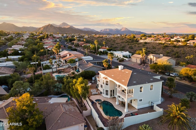 aerial view at dusk with a mountain view