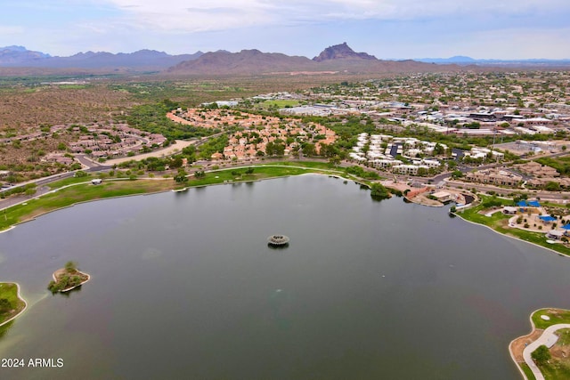 birds eye view of property featuring a water and mountain view