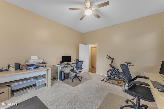 carpeted office with ceiling fan