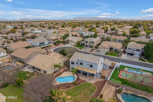 aerial view featuring a mountain view and a residential view