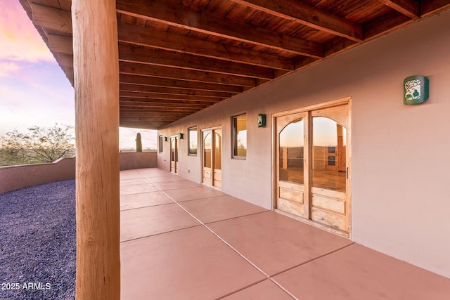 view of patio terrace at dusk