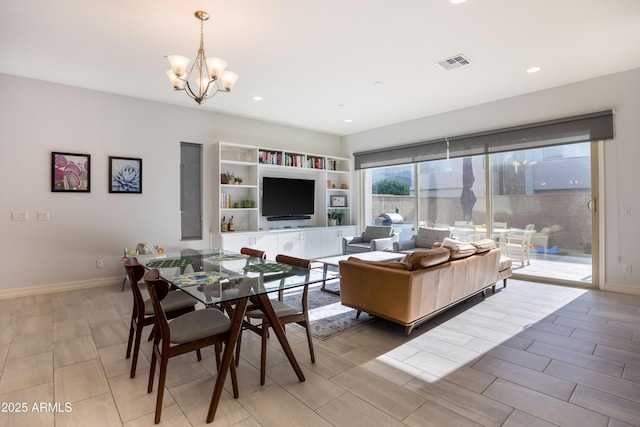 living room featuring a chandelier