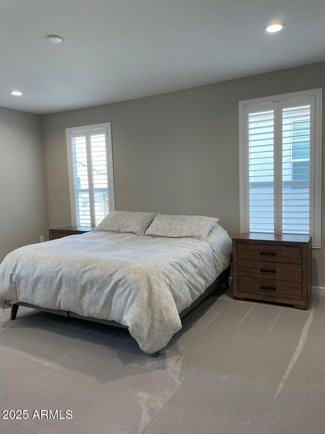 bedroom featuring carpet and recessed lighting