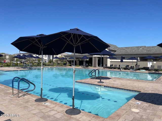 pool featuring a patio area