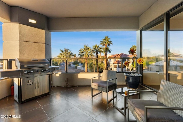 view of patio featuring a balcony and area for grilling