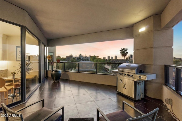 balcony featuring grilling area and a view of city