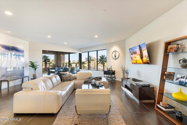 living area with tile patterned flooring and recessed lighting